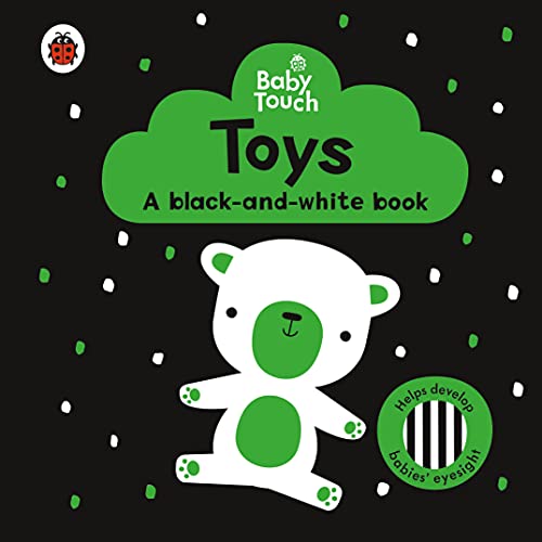 Black and white board book cover with a cartoon bear and dots.