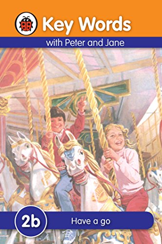 Book cover: "Key Words 2b Have a go" with children on a carousel.