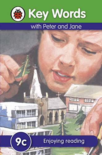 Book cover: child with miniature village, text "Key Words: 9c Enjoying reading".