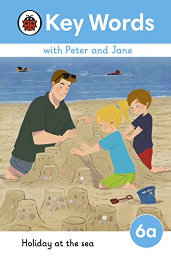 Children building a sandcastle with a father on a beach.