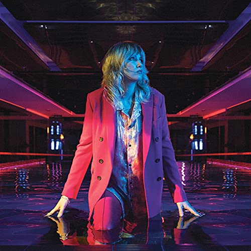 Ladyhawke album cover: woman in red suit, mirrored hallway, water.