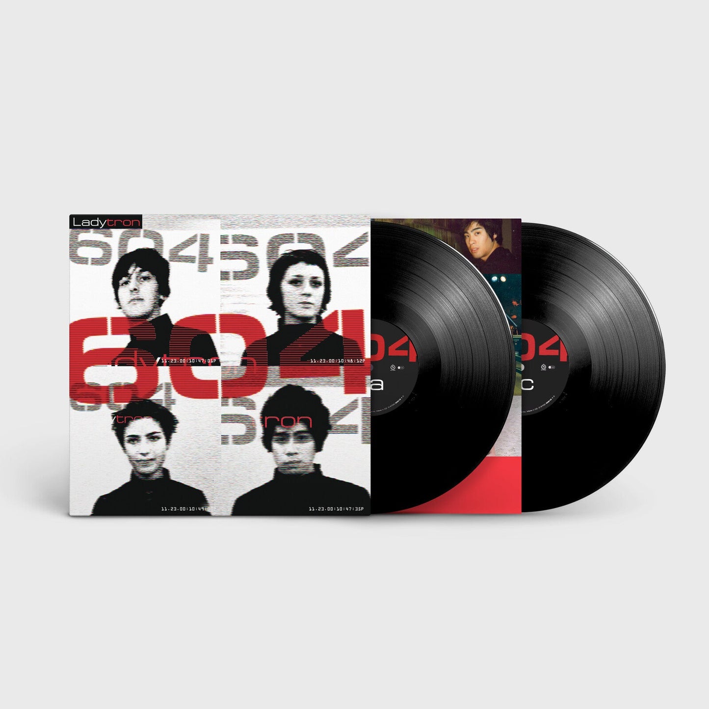 Ladytron 604 vinyl record album cover featuring four portraits and two black vinyl discs.