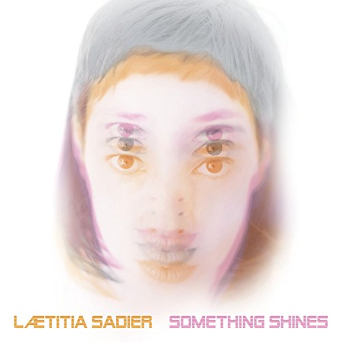 Album cover for Laetitia Sadier’s “Something Shines” featuring a distorted portrait.