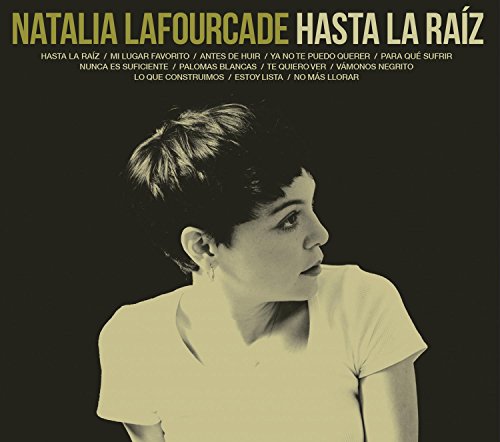 Natalia Lafourcade album cover, "Hasta La Raiz," sepia-toned portrait.