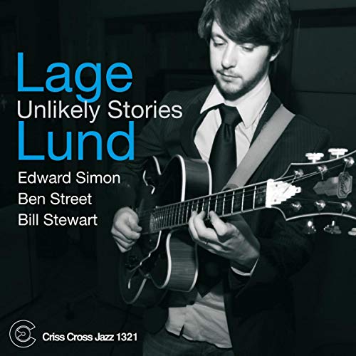 "Lage Lund's album cover featuring a man in a suit playing guitar."