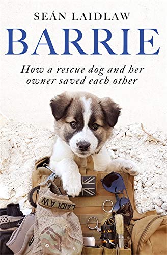 Book cover featuring a small, fluffy dog resting on military gear.
