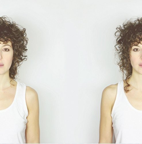 Two identical mirrored portraits of a woman with curly hair wearing a white tank.