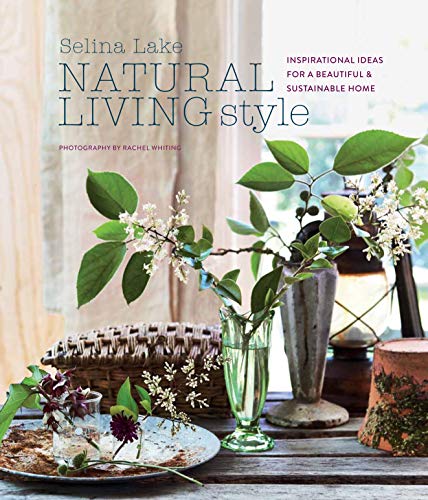 Book cover featuring white blossoms in glass vases on a rustic wooden table.