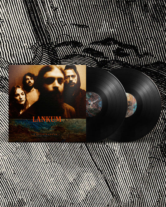 "Black vinyl records with album cover featuring three people and 'Lankum' in orange text."