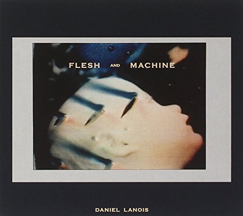 Album cover with Polaroid image of a person with metal fingers on their face.