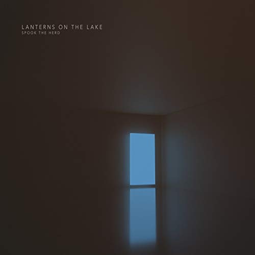 Album cover: dark room with a bright blue rectangular window.