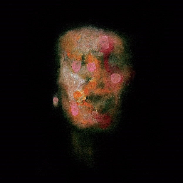 Blurred, abstract portrait with pink and orange spots against black.