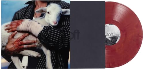 Lany Soft album art showing a person holding a lamb, with a red vinyl record.