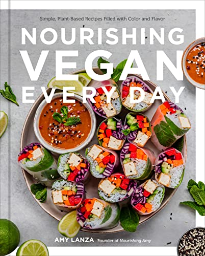 Cookbook cover with colorful vegan spring rolls and a vibrant bowl.