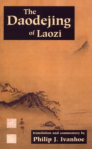Book cover with mountain landscape and text in gold on black rectangles.