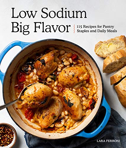 Cookbook cover featuring chicken and beans in a blue pot with bread.