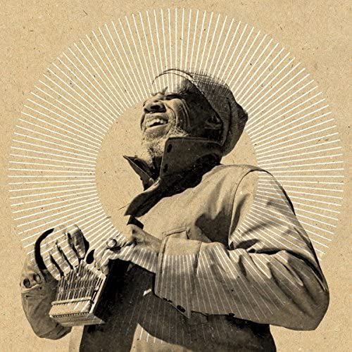 Sepia-toned portrait of Laraaji with a zither, radiating lines behind.