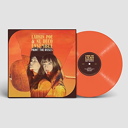 Orange vinyl record and album cover featuring two women in profile.