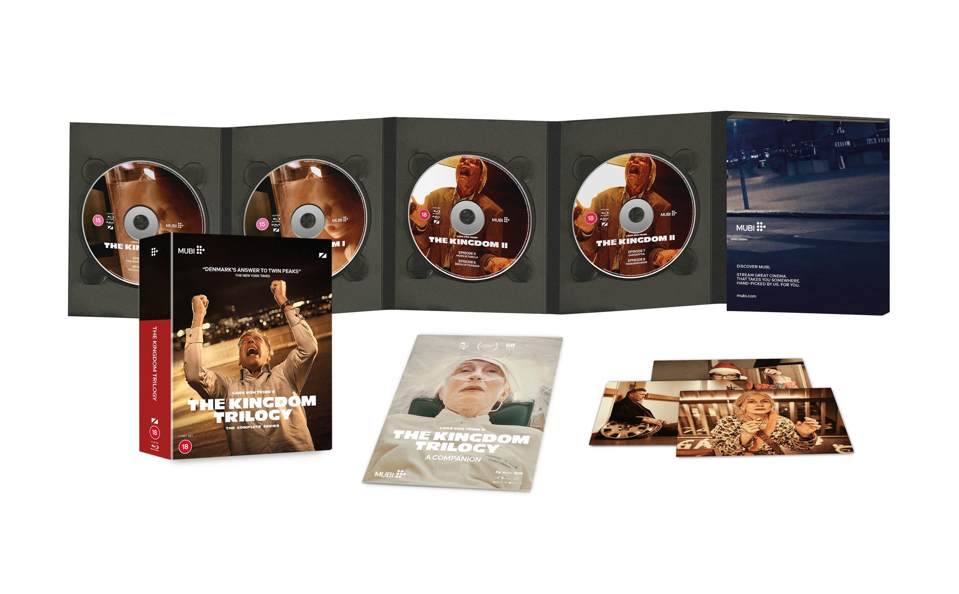 The Kingdom Trilogy Blu-ray set including discs, a companion book, and promotional art cards.