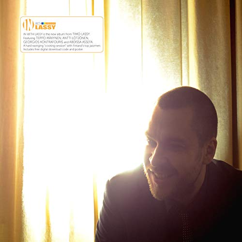 Vinyl album cover featuring a man in profile, bathed in sunlight.