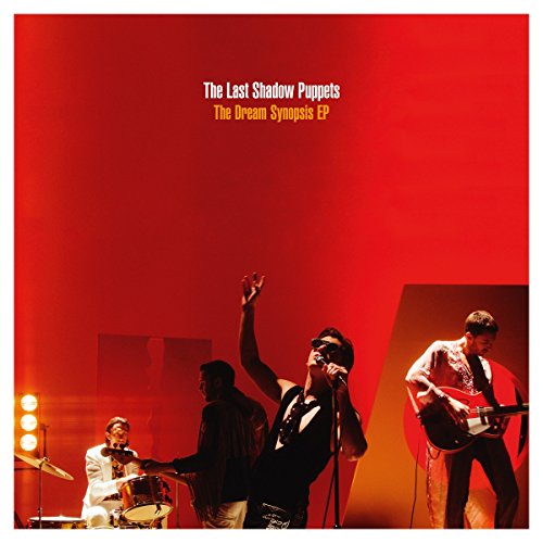 Red album cover featuring The Last Shadow Puppets performing onstage.