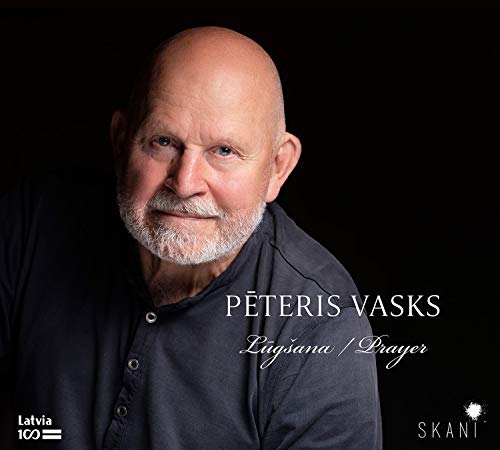 Portrait of composer Pēteris Vasks on CD cover, dark background.