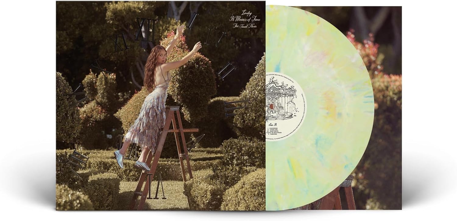 Laufey album cover and pale yellow vinyl record shown.