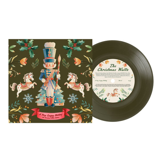 Laufey’s “The Christmas Waltz” vinyl record with festive, colorful artwork.
