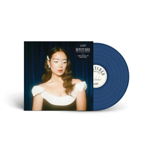 Dark blue vinyl record with Laufey’s portrait on the cover.