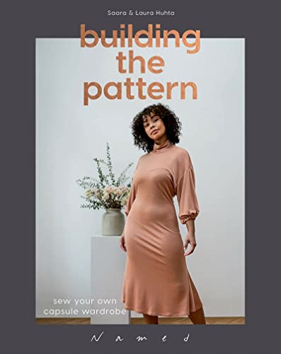 Book cover featuring a woman in a peach dress, sewing themed.