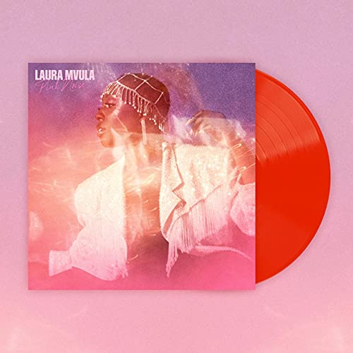 Laura Mvula’s “Pink Noise” vinyl record with a portrait cover and orange disc.