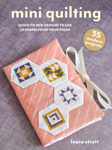 Book cover featuring a pink quilted piece with geometric patterns.