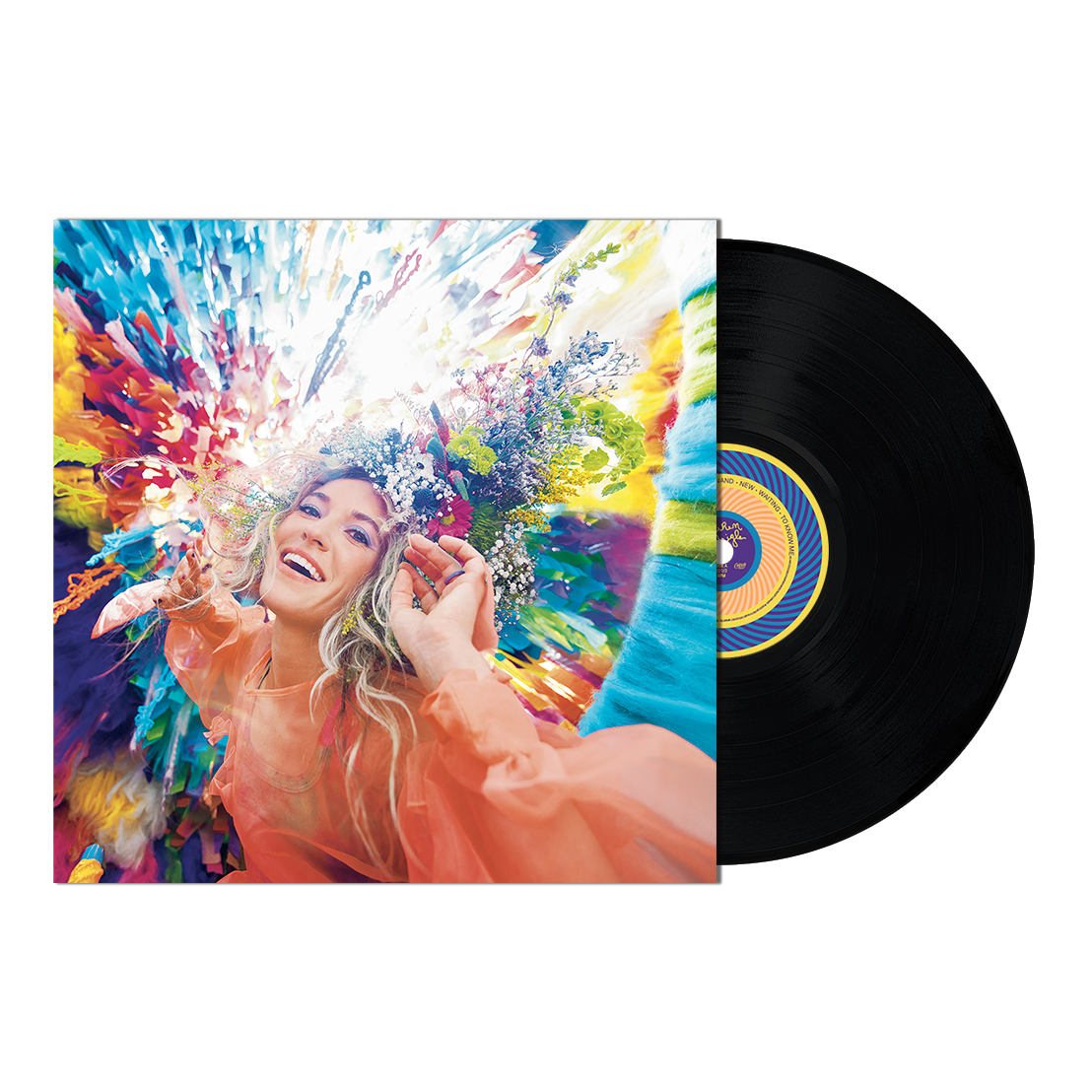 Lauren Daigle album cover and black vinyl record with colorful label.