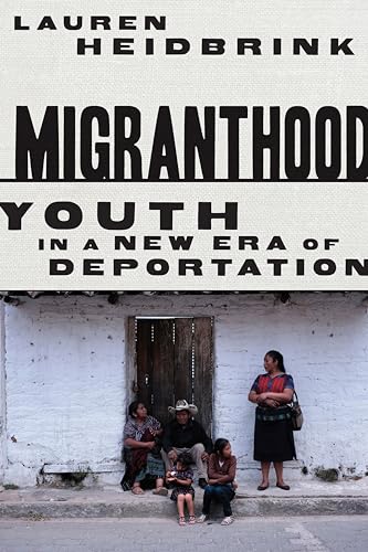 Book cover with title "Migranthood" and a family seated outdoors.