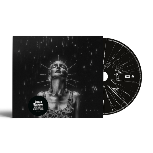 CD case for Lauren Mayberry’s “Vicious Creature” with fractured imagery.