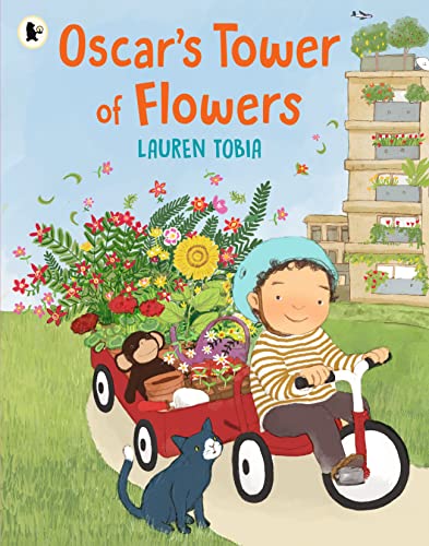 A child on a tricycle pulls a wagon filled with flowers beside a cat.
