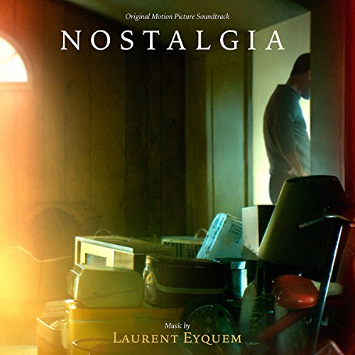 "CD cover with 'Nostalgia' title, man in doorway, and old electronics on a table."