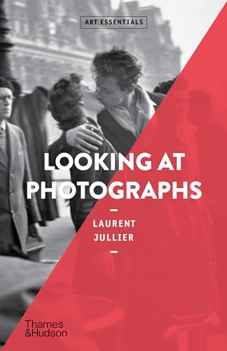 Book cover featuring a black and white photograph of a couple kissing on a street.