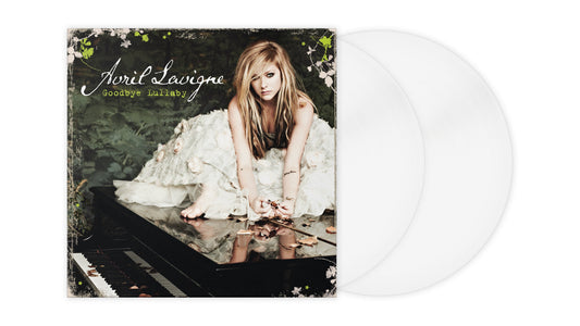 Avril Lavigne sitting on a piano on the Goodbye Lullaby album cover with vinyl records.