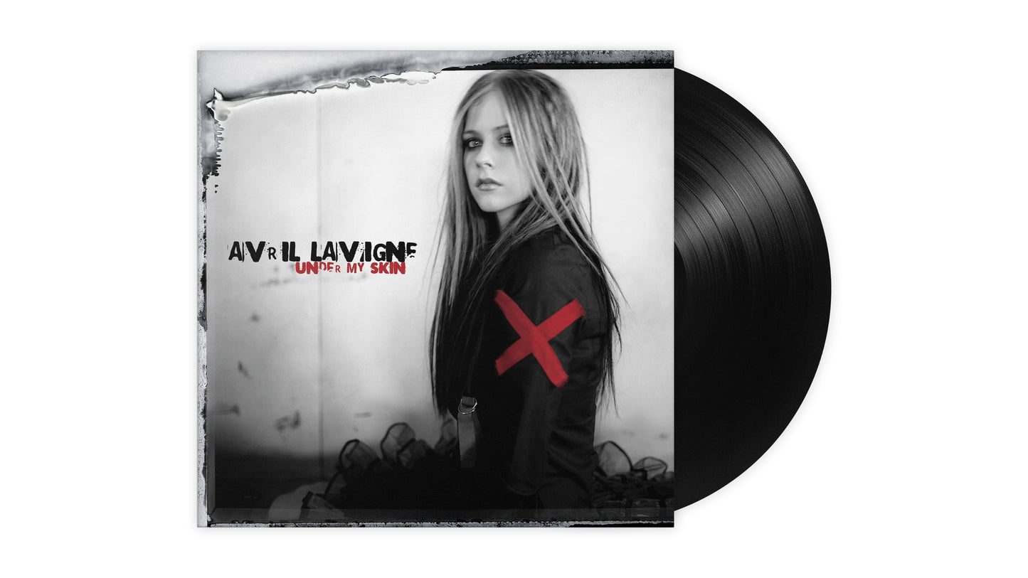 Avril Lavigne Under My Skin vinyl record cover featuring the artist and black disc.