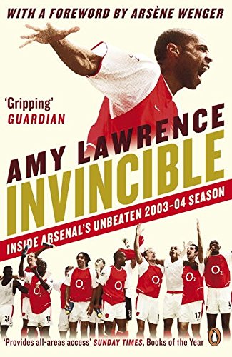 Book cover with soccer players in red and white, titled "Invincible" by Amy Lawrence.