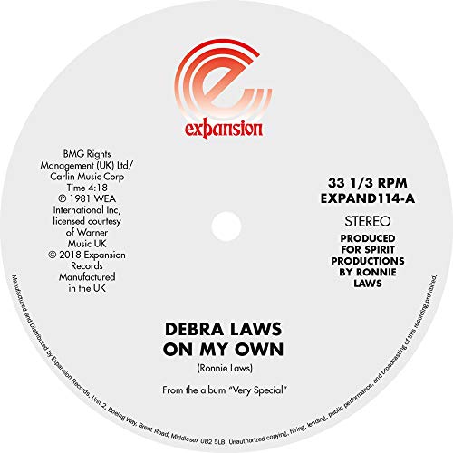 White vinyl record label with red logo and black text, displaying song and artist information.