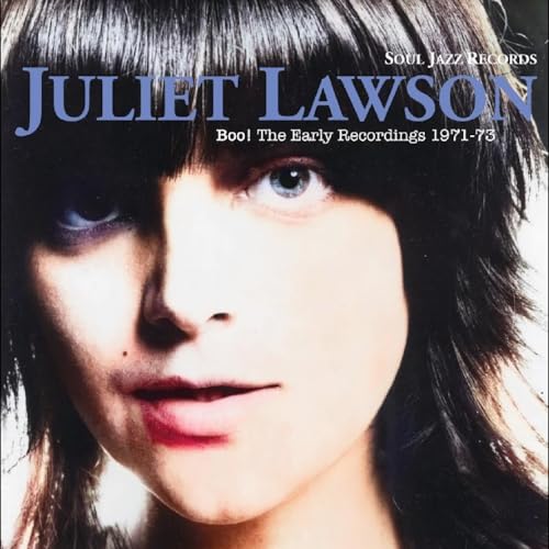 Close-up of Juliet Lawson album cover with dark hair and blue eyes.