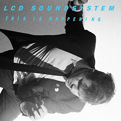 LCD Soundsystem album cover, “This Is Happening,” featuring a man in a suit.