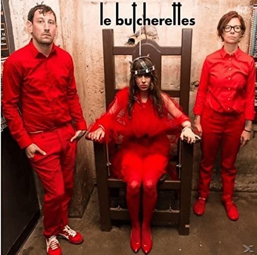 Le Butcherettes album cover featuring three people in red clothing.