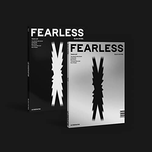 Two Le Sserafim Fearless CD albums, one black and one silver, on dark background.