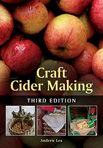 Book cover with apples and images of cider-making equipment.