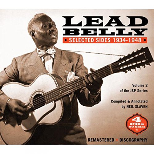 CD cover featuring Lead Belly holding a guitar, wearing a suit and bow tie.