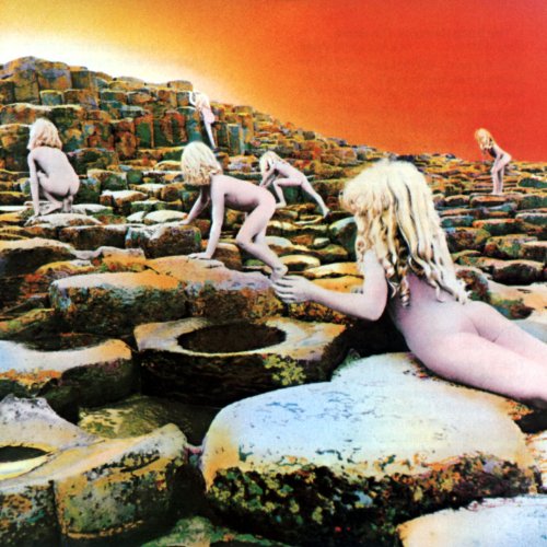 Album cover: children on a rocky hillside under an orange sky.