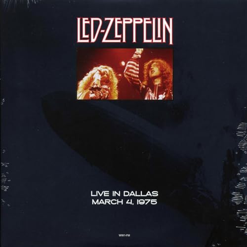 Led Zeppelin album cover: band performing onstage with airship graphic.